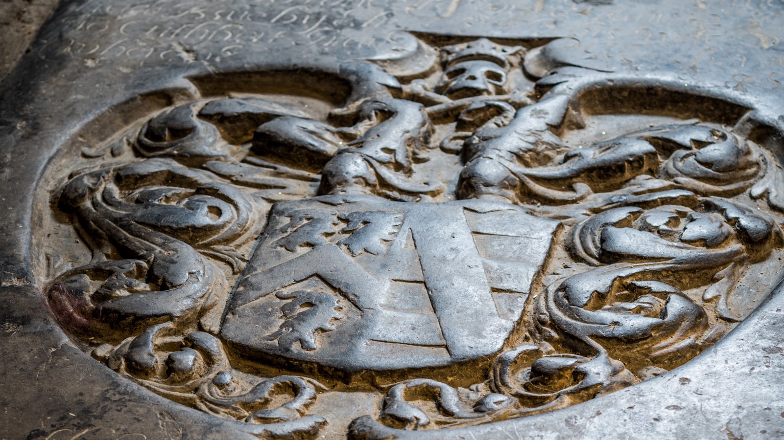 Close-up of a carved coat of arms from a Cathedral ledger stone